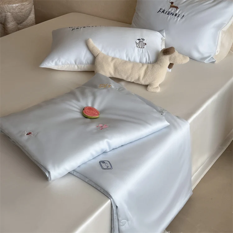 Silky-smooth satin bedding set with delicate embroidered icons Stornfield