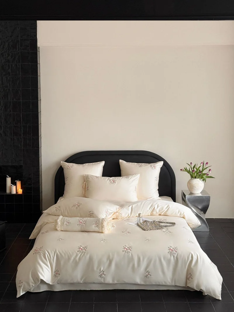 Satin bed linen set with floral hand embroidery and silky shiny finish Stornfield