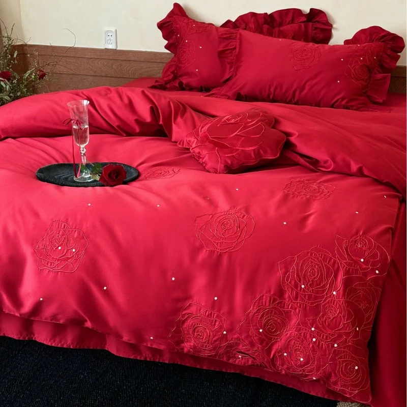 Satin bedding set with rose embroidery, ruffled pillow and decorative pillow Stornfield