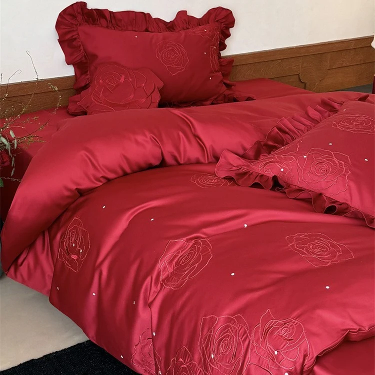 Satin bedding set with rose embroidery, ruffled pillow and decorative pillow Stornfield