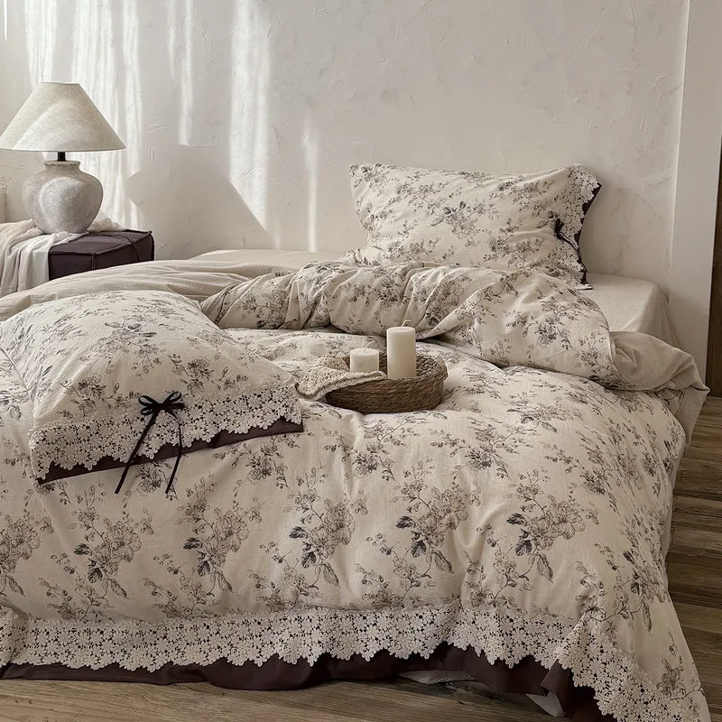 Satin bed linen set with romantic floral pattern and lace border Stornfield