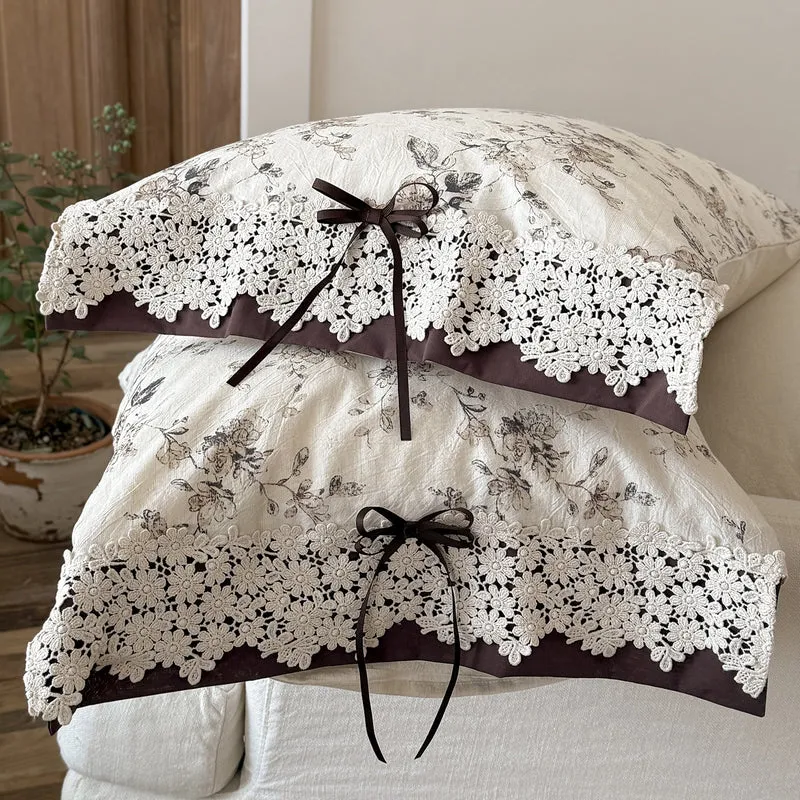 Satin bed linen set with romantic floral pattern and lace border Stornfield