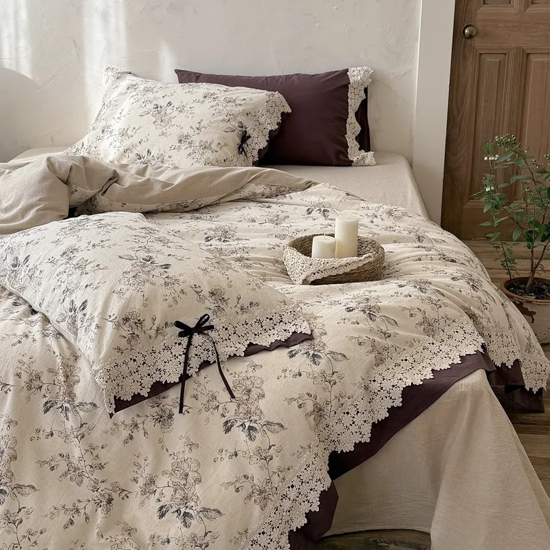 Satin bed linen set with romantic floral pattern and lace border Stornfield
