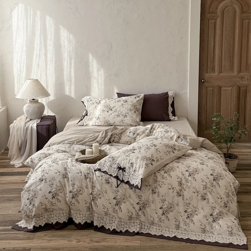 Satin bed linen set with romantic floral pattern and lace border Stornfield