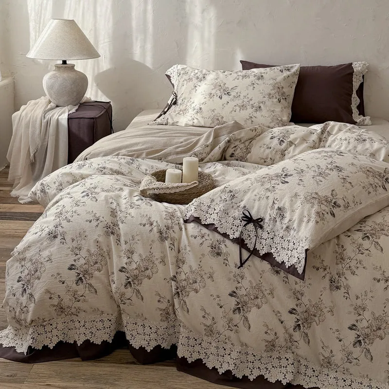Satin bed linen set with romantic floral pattern and lace border Stornfield