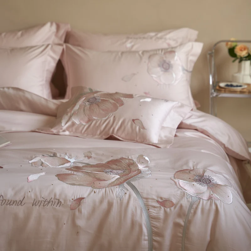 Satin bedding set with floral relief embroidery and velvety shine Stornfield