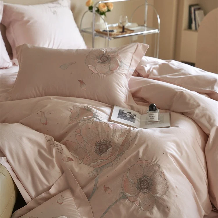 Satin bedding set with floral relief embroidery and velvety shine Stornfield
