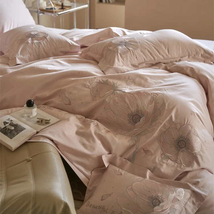 Satin bedding set with floral relief embroidery and velvety shine Stornfield