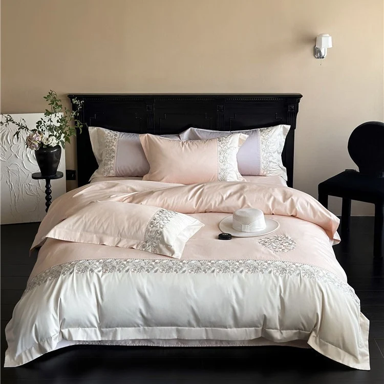 Satin bedding set with floral relief embroidery and velvety shine Stornfield