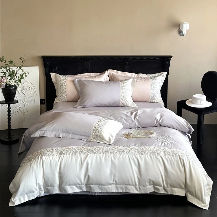 Satin bedding set with floral relief embroidery and velvety shine Stornfield