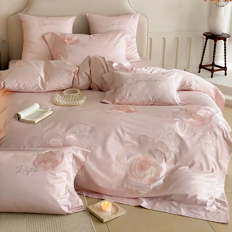 Satin bedding set with floral relief embroidery and velvety shine Stornfield