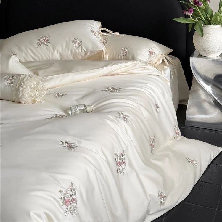 Satin bedding set with floral relief embroidery and velvety shine Stornfield