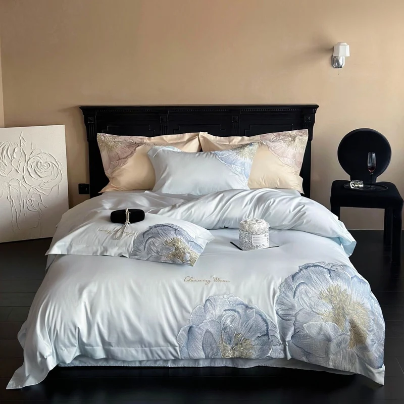 Satin bedding set with floral relief embroidery and velvety shine Stornfield