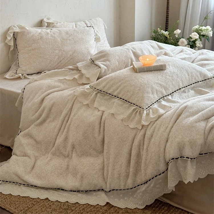 Romantic bedding set with ruffles, lace and subtle flower pattern Stornfield