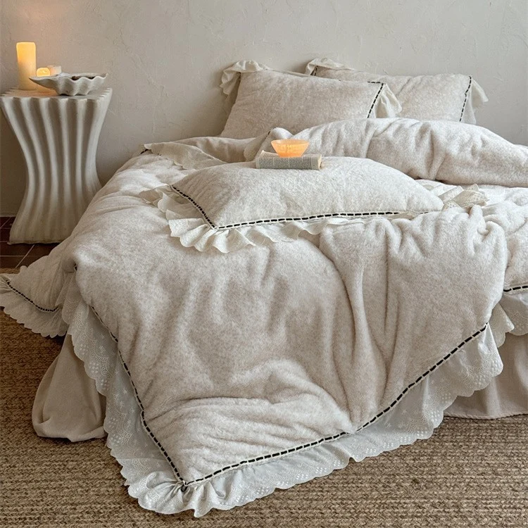 Romantic bedding set with ruffles, lace and subtle flower pattern Stornfield