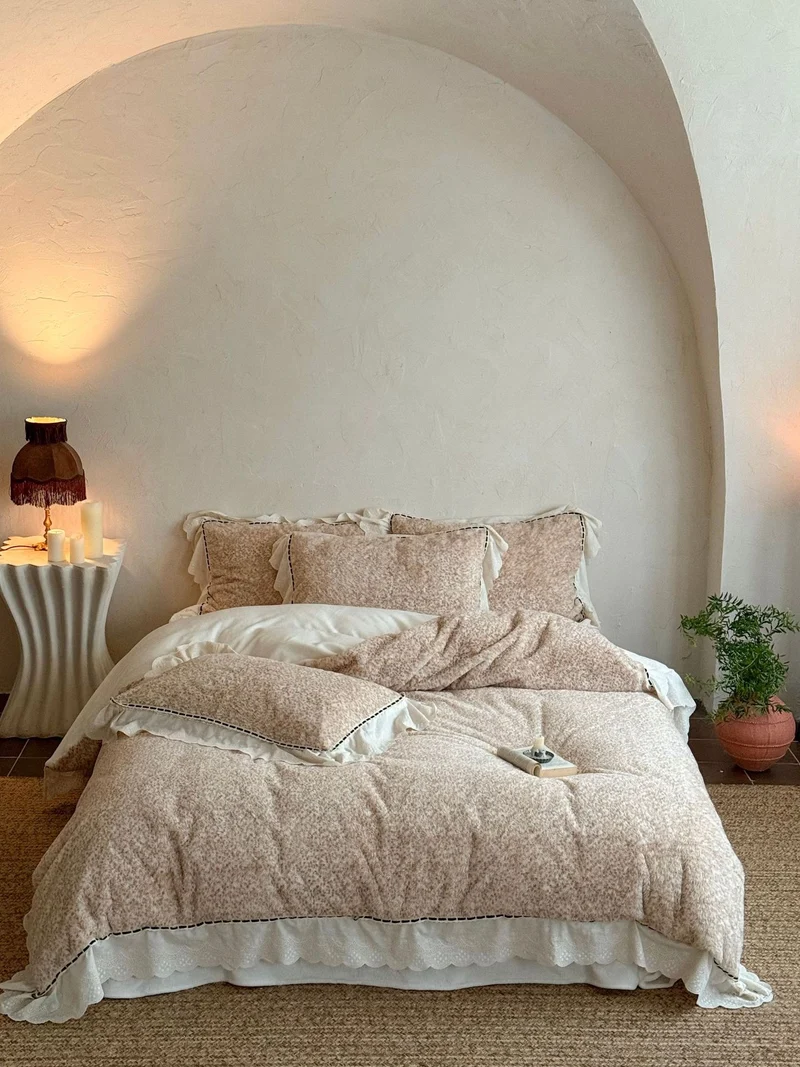 Romantic bedding set with ruffles, lace and subtle flower pattern Stornfield