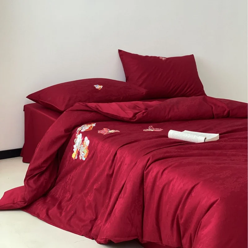 Premium bedding set made of Mako cotton satin with floral jacquard structure and embroidered applications Stornfield