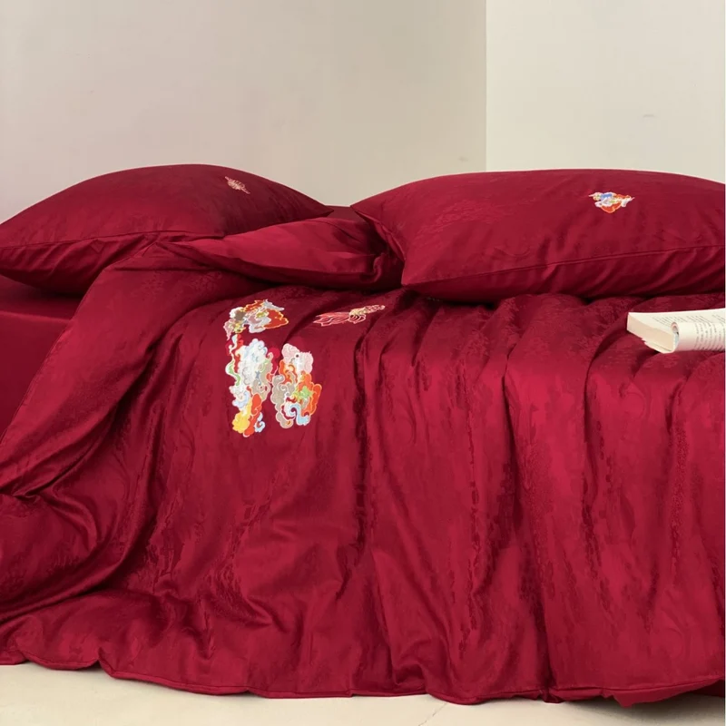 Premium bedding set made of Mako cotton satin with floral jacquard structure and embroidered applications Stornfield