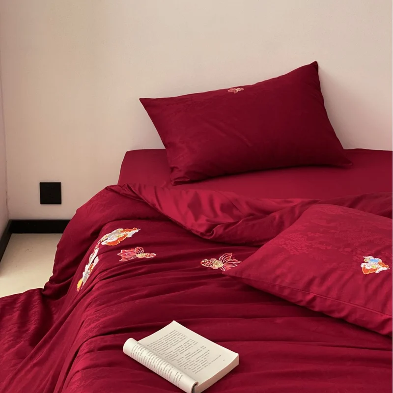 Premium bedding set made of Mako cotton satin with floral jacquard structure and embroidered applications Stornfield
