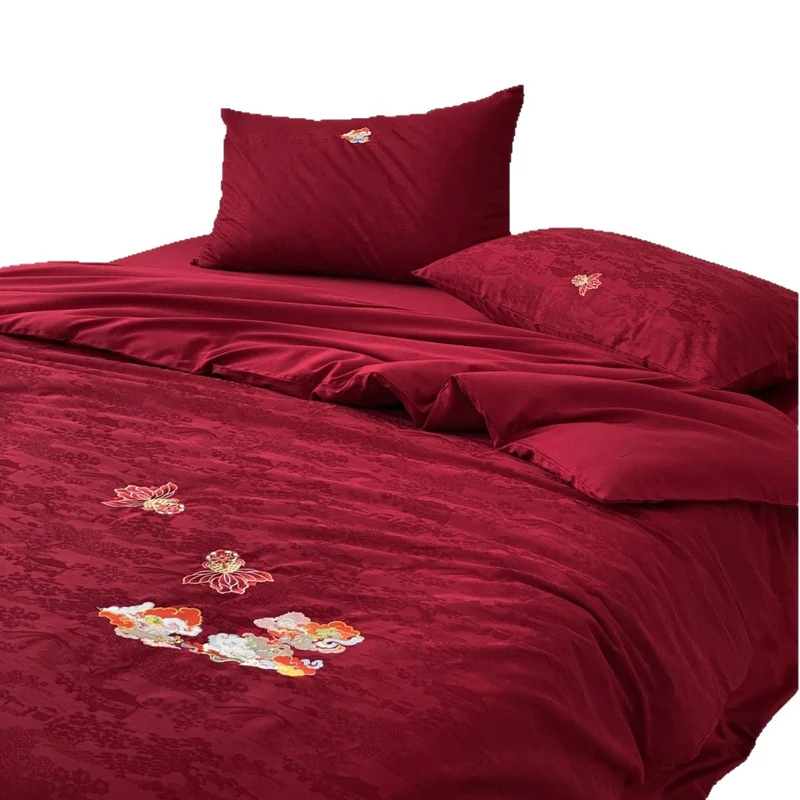 Premium bedding set made of Mako cotton satin with floral jacquard structure and embroidered applications Stornfield