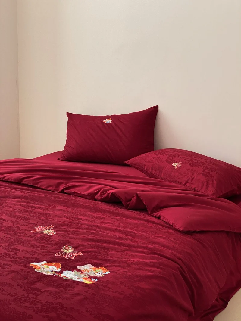 Premium bedding set made of Mako cotton satin with floral jacquard structure and embroidered applications Stornfield