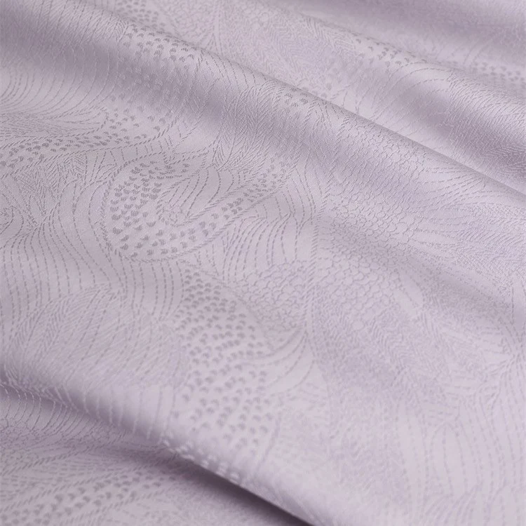 Premium duvet cover set with subtle jacquard structure and decorative ribbon Stornfield