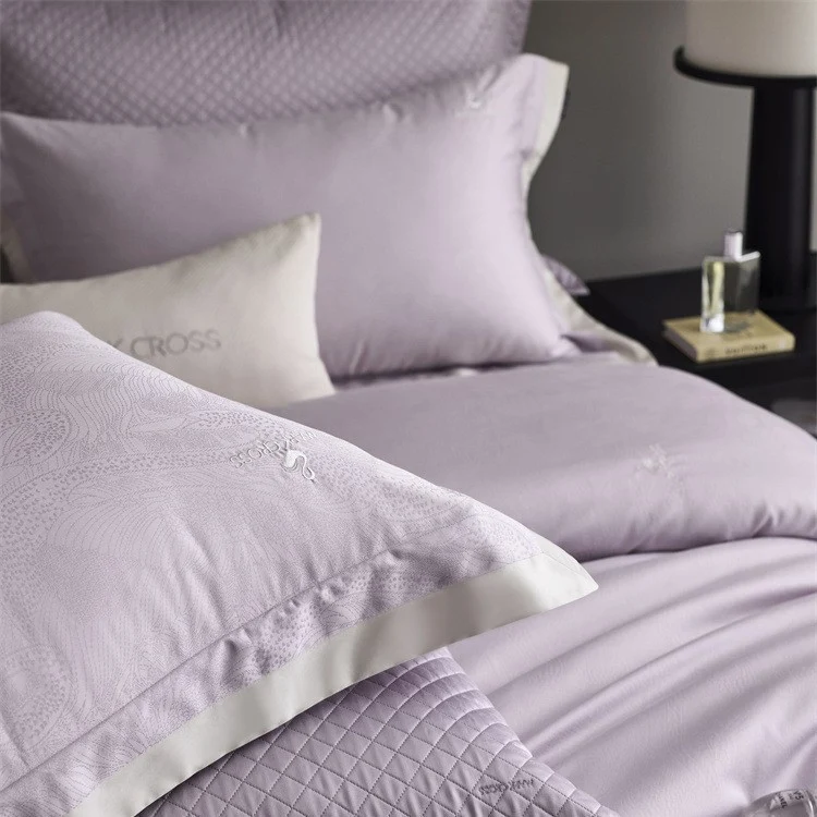 Premium duvet cover set with subtle jacquard structure and decorative ribbon Stornfield
