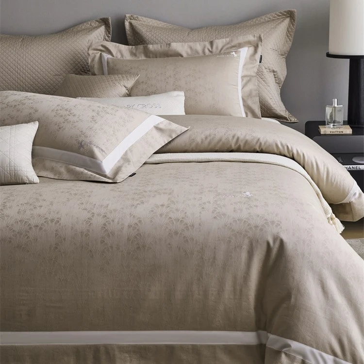 Premium duvet cover set with subtle jacquard structure and decorative ribbon Stornfield