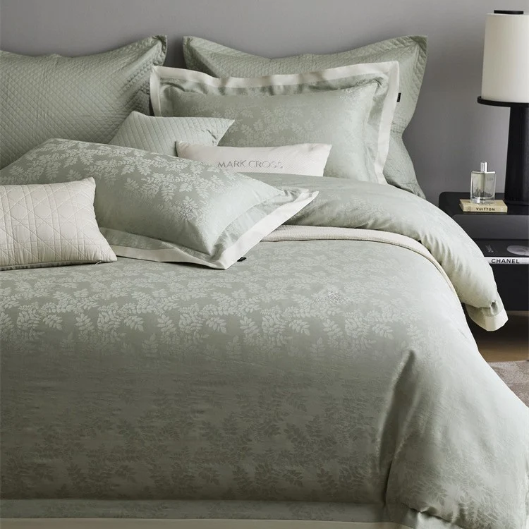 Premium duvet cover set with subtle jacquard structure and decorative ribbon Stornfield