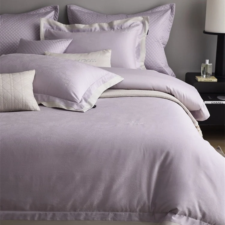Premium duvet cover set with subtle jacquard structure and decorative ribbon Stornfield