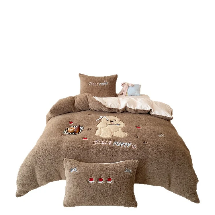Plush bedding set with Sherpa finish, quilted cozy blanket, and embroidered puppy motif Stornfield