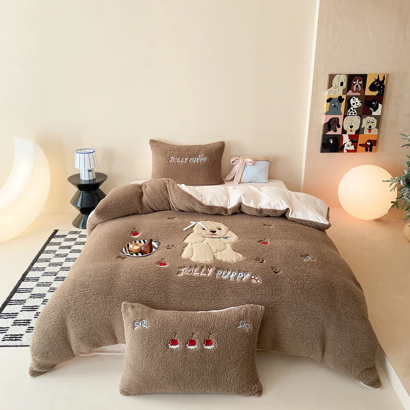 Plush bedding set with Sherpa finish, quilted cozy blanket, and embroidered puppy motif Stornfield