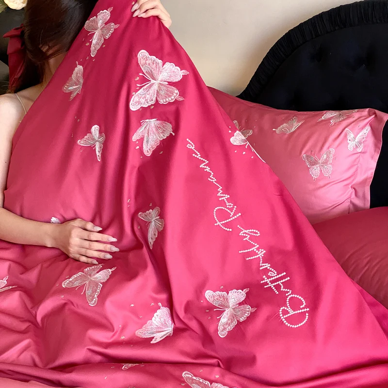 Luxury satin bedding set with embroidered butterfly appliqués Stornfield