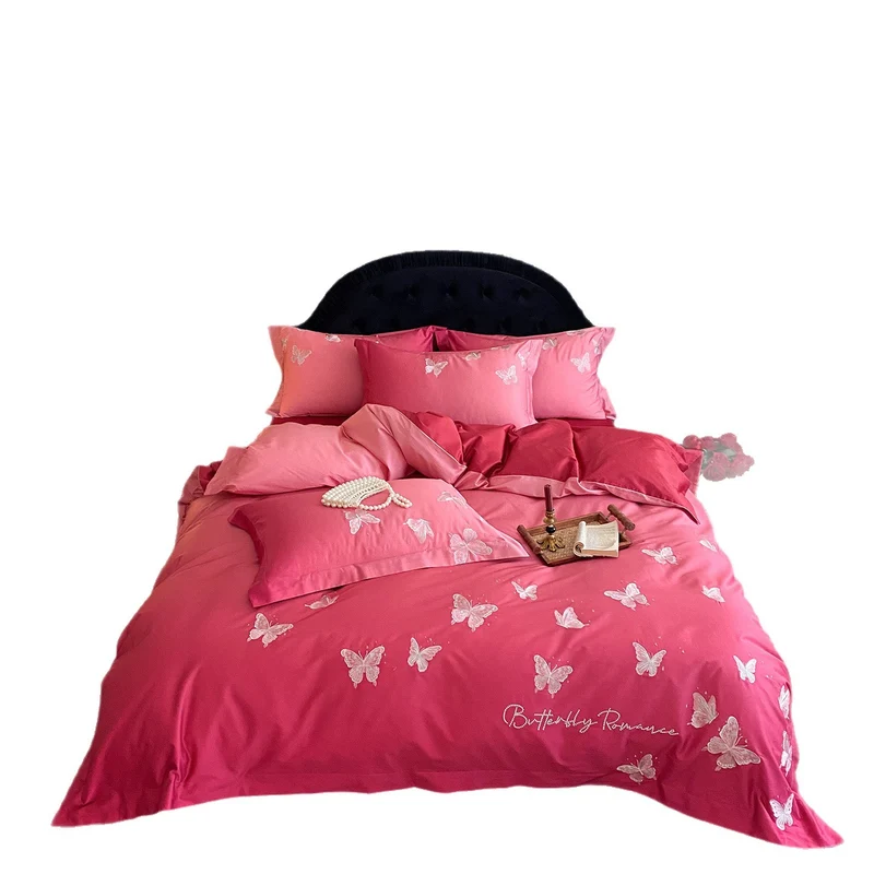 Luxury satin bedding set with embroidered butterfly appliqués Stornfield