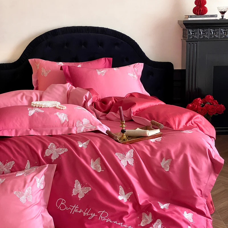 Luxury satin bedding set with embroidered butterfly appliqués Stornfield