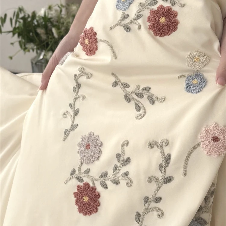 Luxurious satin bedding set with floral embroidery and pillowcases Stornfield