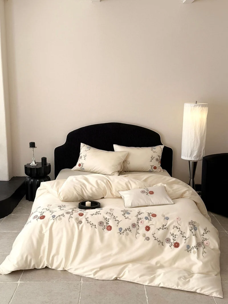 Luxurious satin bedding set with floral embroidery and pillowcases Stornfield