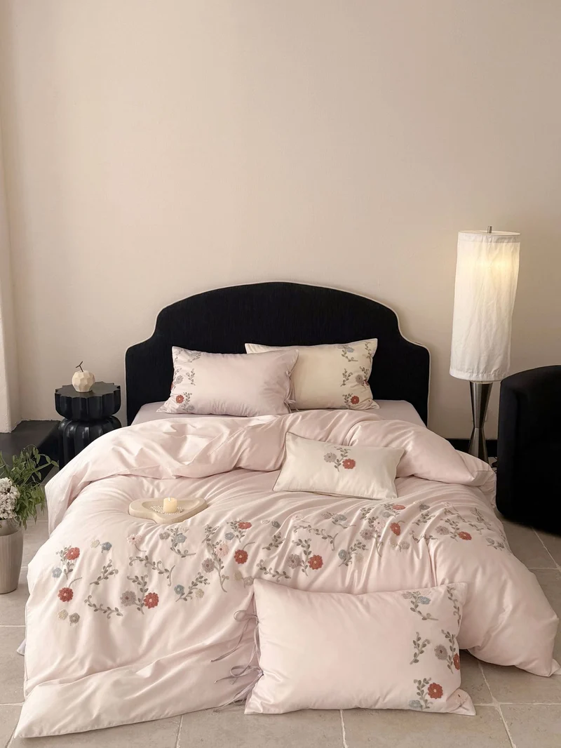 Luxurious satin bedding set with floral embroidery and pillowcases Stornfield