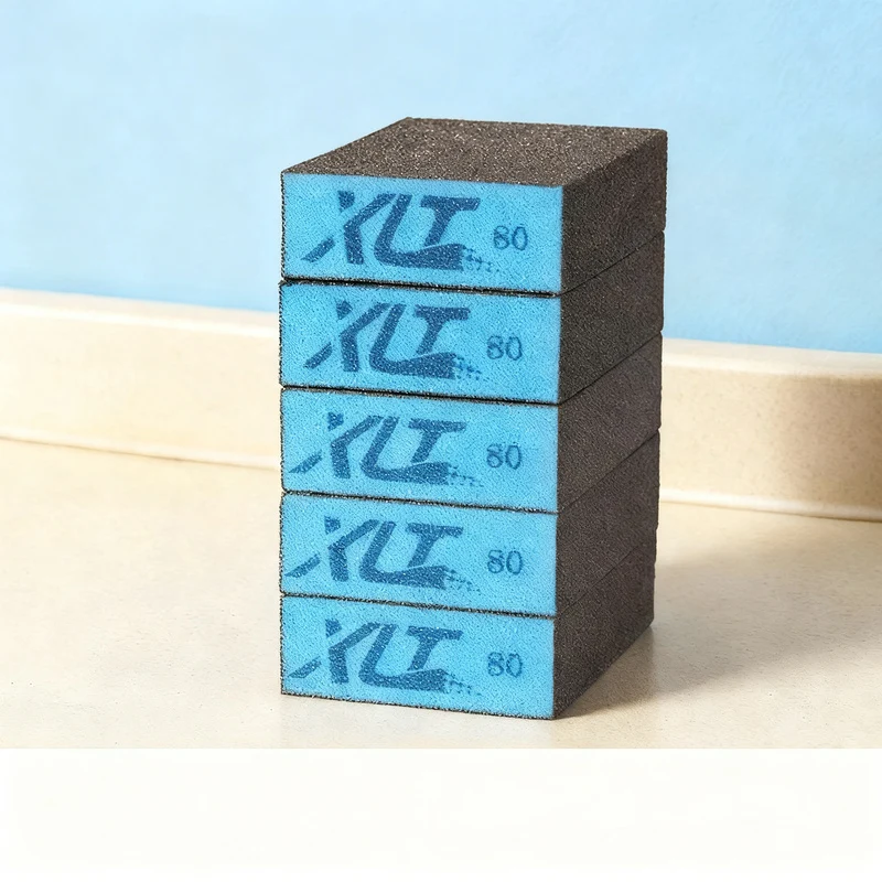 Abrasive sponge with grain for pots and pans