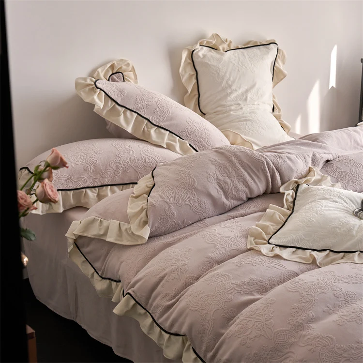 Jacquard bedding set with ruffle, fine floral embossing and contrasting piping Stornfield