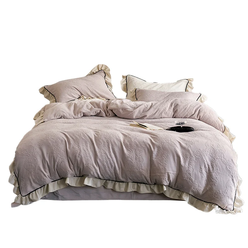 Jacquard bedding set with ruffle, fine floral embossing and contrasting piping Stornfield