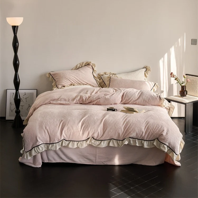 Jacquard bedding set with ruffle, fine floral embossing and contrasting piping Stornfield