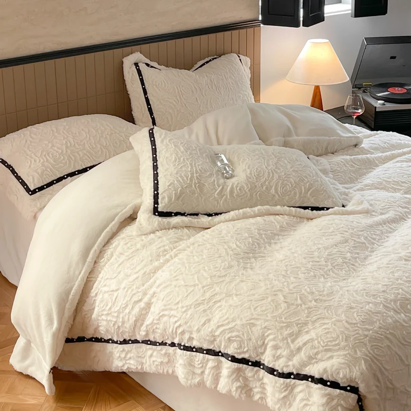 Quilted rose relief bed cover with decorative trim and pillowcases Stornfield