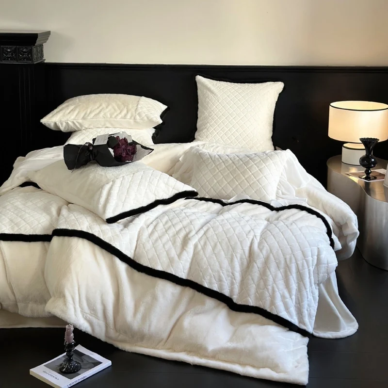 Quilted bedding and blanket set with contrast piping and velvety soft finish Stornfield