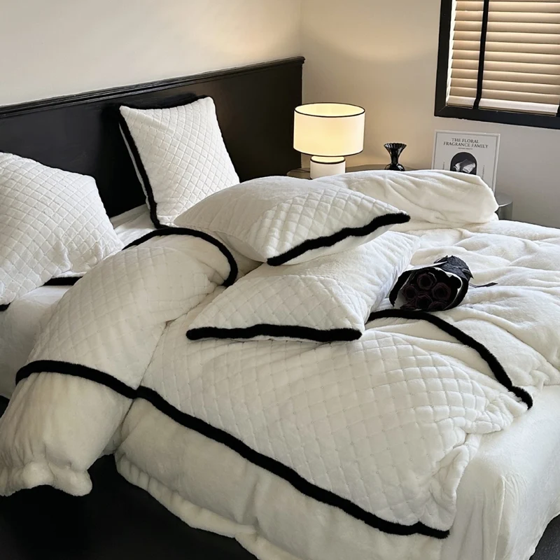 Quilted bedding and blanket set with contrast piping and velvety soft finish Stornfield