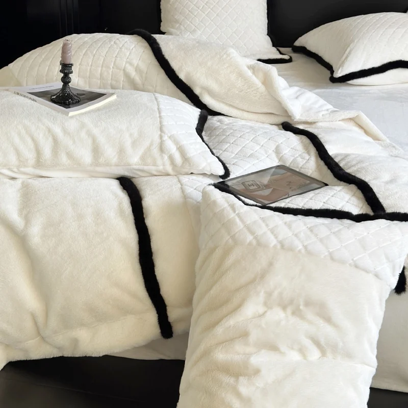 Quilted bedding and blanket set with contrast piping and velvety soft finish Stornfield