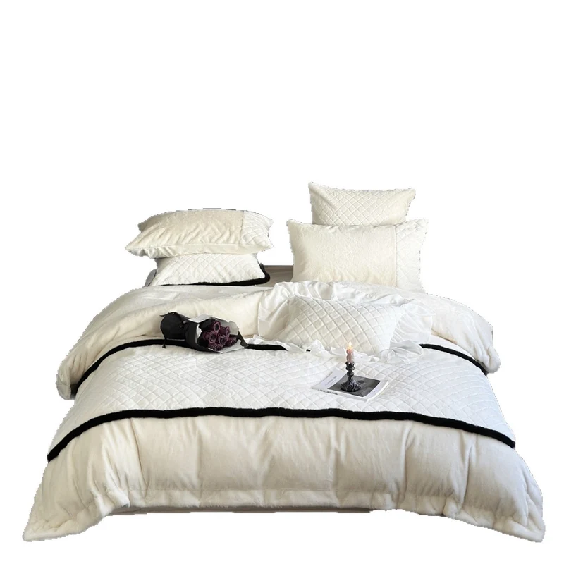 Quilted bedding and blanket set with contrast piping and velvety soft finish Stornfield