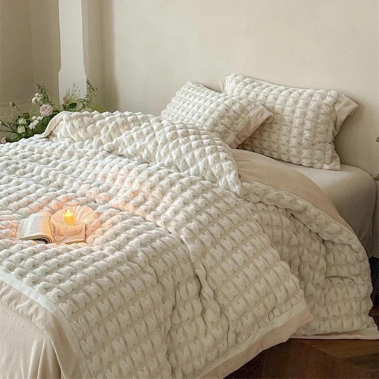 Quilted velvet bedding set with 3D waffle structure and decorative border Stornfield