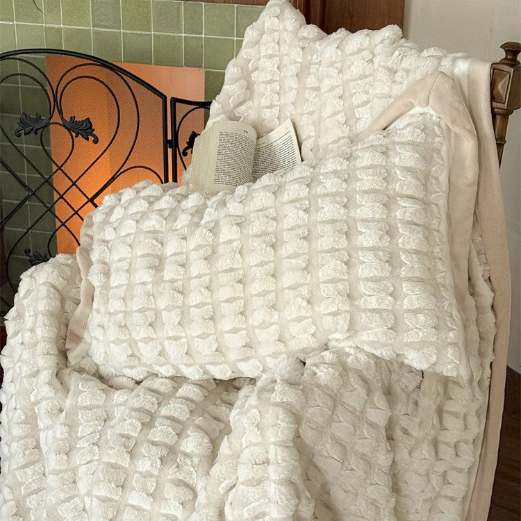 Quilted velvet bedding set with 3D waffle structure and decorative border Stornfield