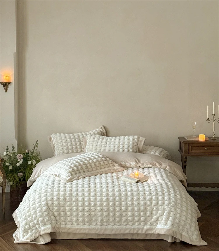 Quilted velvet bedding set with 3D waffle structure and decorative border Stornfield